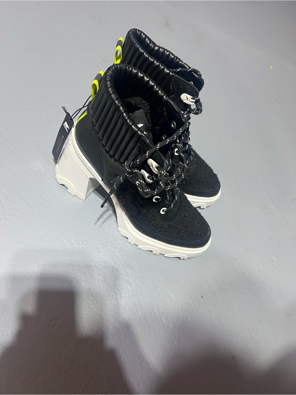 Sorel Black and White Chunky Heel Lace-Up Booties with Neon Yellow Pull Tabs